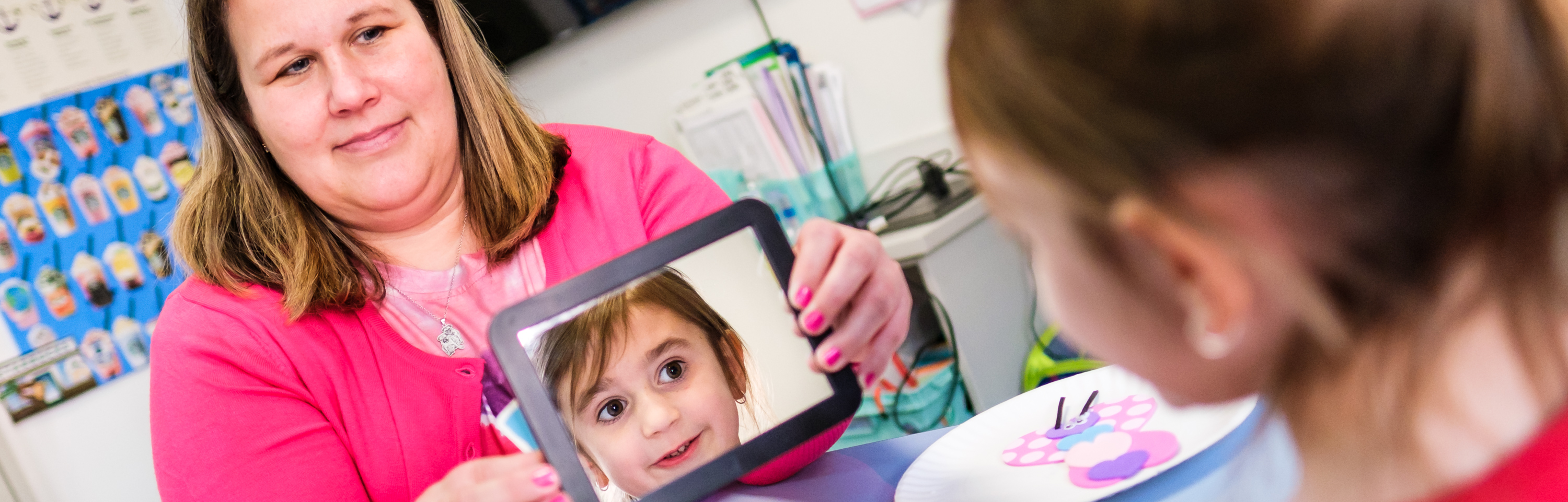 Speech Therapist working with student